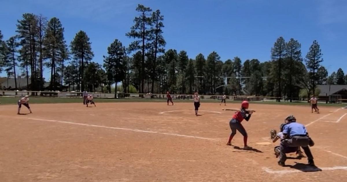 There are 128 teams in a softball tournament. In each round, half of the  teams are eliminated. Which 