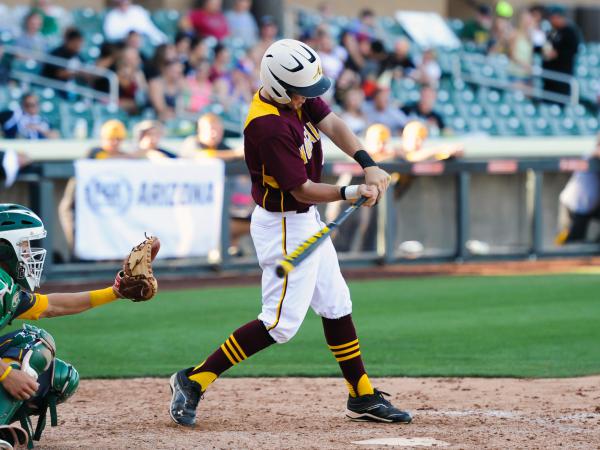 Unidentified Nogales player takes a swing during the game. Photo by Mark Jones/maxpreps.com