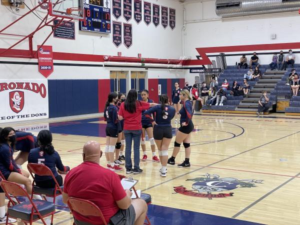 Head coach Shannon McClure talks to her team during a timeout in the first set. 