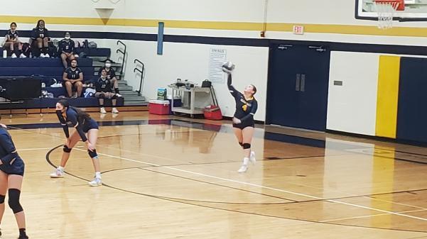 Julianna  Castillo serves the ball for Bourgade Catholic