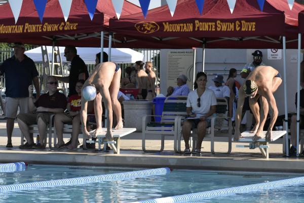 Hamblin (left) takes his mark before the 200 IM against Mountain Pointe. (John Cascella/AZPreps365)