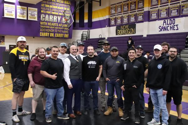 Coach D with former Mesa wrestlers