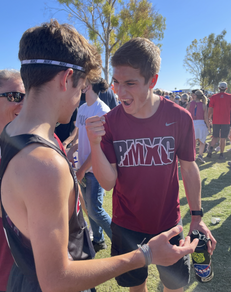 Joey Hamilton congratulates young brother Matthew following The 2021 AIA State Cross Country Championships at Cave Creek Golf Course in Phoenix. 