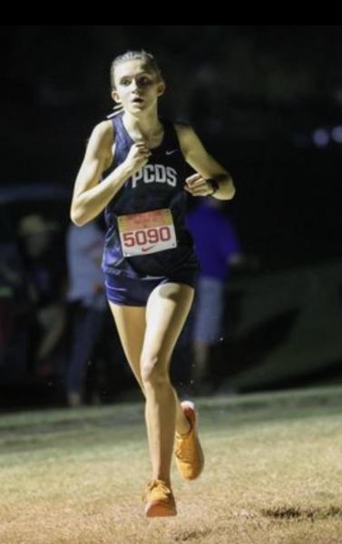 Kimi Cahoon runs in a 2022 cross country meet. (Photo Courtesy of Kimi Cahoon)