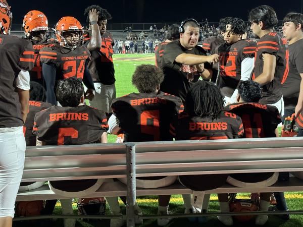 Trevor G. Browne head coach, Francisco Rangel talking to his defense are allowing the fourth touchdown of the night. [Dylan Ledahl photo AZPreps365]