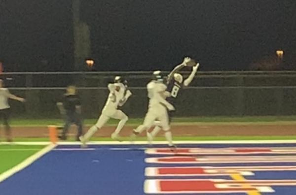 Sierra Linda junior wide receiver Seth Daily stretches to catch his second touchdown pass of the day and give Sierra Linda the 14-13 lead over Gila Ridge with under 2 minutes remaining in the game Friday night in Phoenix. (Oliver Fell photo/AZPreps365)