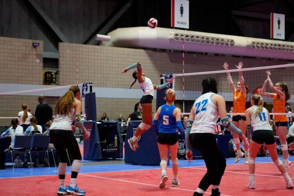 Piper Garvin spikes the ball (Photo provided by Piper Garvin)